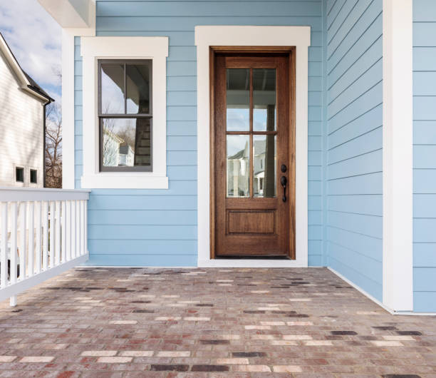 istock Front door, brown front door with light blue exterior 1130206176