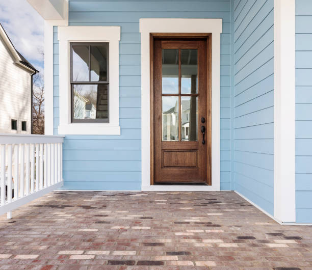 Front door, brown front door with light blue exterior stock photo