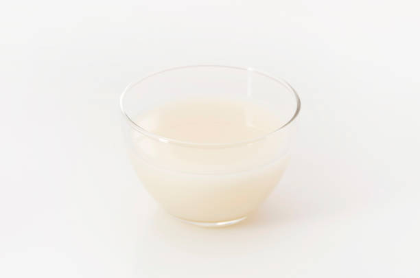 Amazake, A traditional sweet, non-alcoholic Japanese drink made from fermented rice. Amazake, A traditional sweet, non-alcoholic Japanese drink made from fermented rice. oligosaccharide stock pictures, royalty-free photos & images