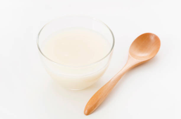 Amazake, A traditional sweet, non-alcoholic Japanese drink made from fermented rice. Amazake, A traditional sweet, non-alcoholic Japanese drink made from fermented rice. oligosaccharide stock pictures, royalty-free photos & images