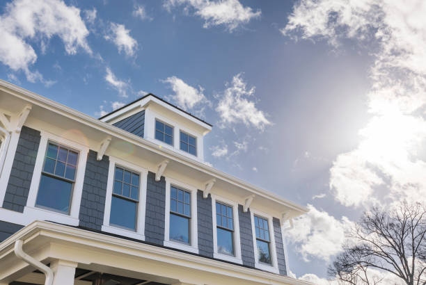 Exterior view of a house with lots of windows Sunny day illuminating a house with many windows Gable stock pictures, royalty-free photos & images