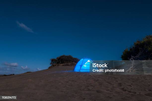 Camping On The Bani Dunes At Night Stock Photo - Download Image Now - Adventure, Arid Climate, Astronomy