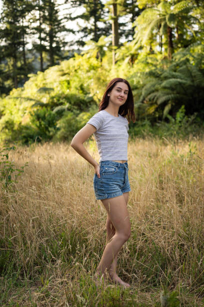 istock Young woman relaxing in the sun 1130216913