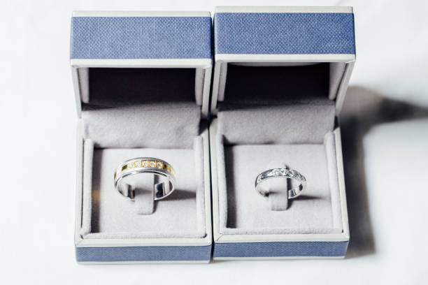 istock Platinum couple wedding rings in open boxes. 1130216955