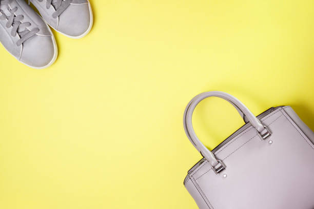 istock women bag and gray sneakers 1130218238