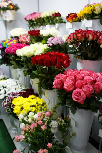 istock Flower shop window with many colorful bouquets 1130218482