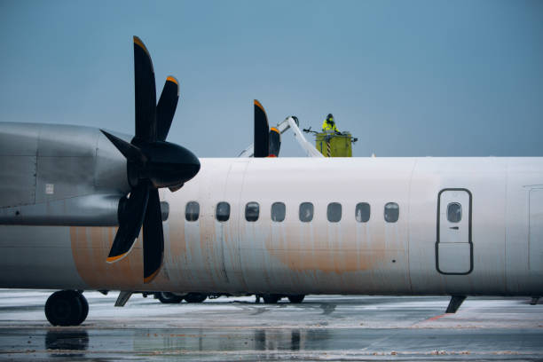 istock Deicing of airplane before flight at the airport 1130219411