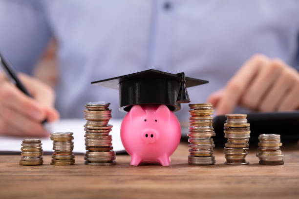 istock Piggy Bank With Graduation Cap 1130220135