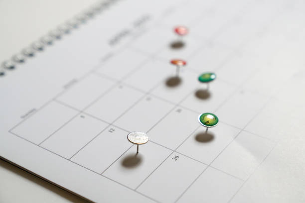 istock Business concept: thumb track on calendar as reminders or deadlines 1130220894