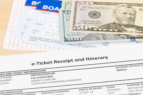 istock E-ticket, dollar money banknote, and boarding pass;  these documents are mock-up 1130222133