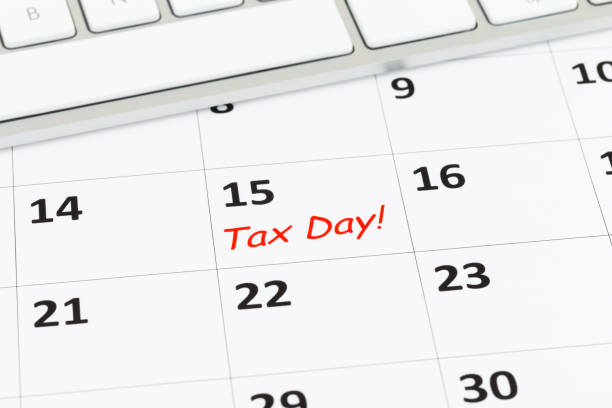 istock Tax day on calendar with keyboard 1130223223