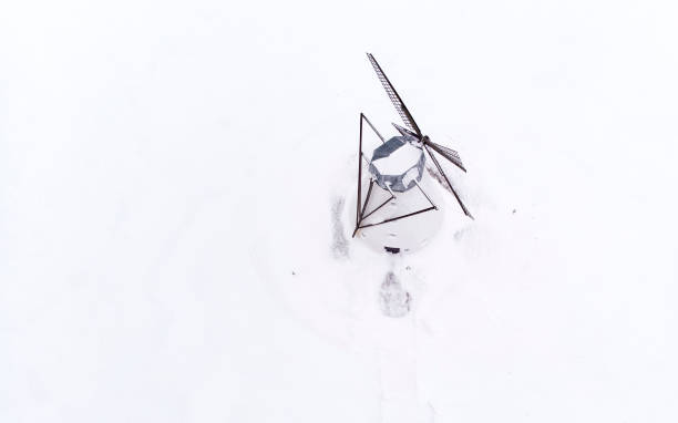 istock old windmill in a snowy field In Estonain countryside 1130224117