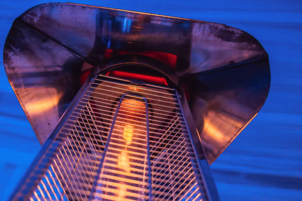 istock heating lamp heater placed among the tables of an open cafe 1130224935
