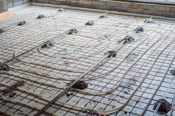 istock Pipe fitter mounted underfloor heating. Heating system and underfloor heating 1130225117