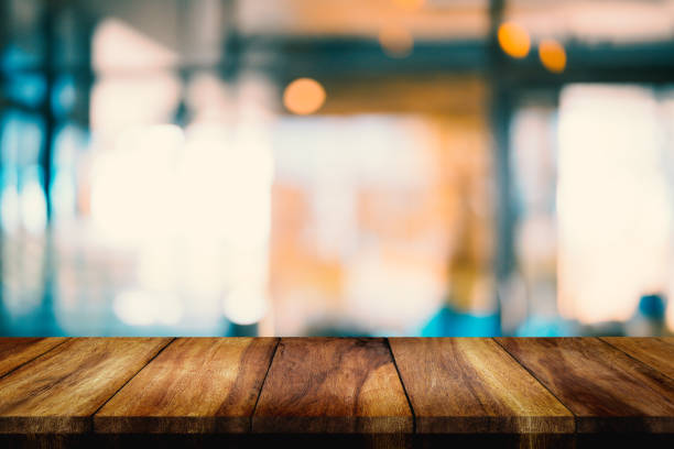 istock Empty wood table with blur interior coffee shop or cafe for background. 1130228088