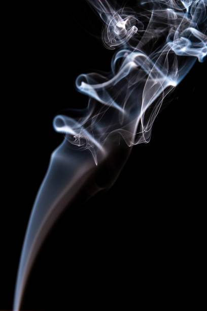 istock Abstract smoke isolated on dark background 1130229914
