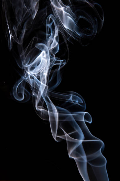 istock Abstract smoke isolated on dark background 1130230060