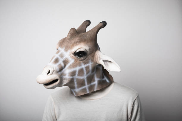 istock Portrait of man with giraffe mask 1130232978