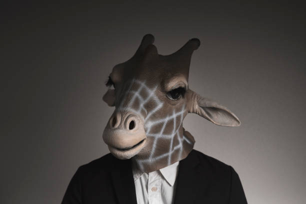 istock Portrait of man with giraffe mask 1130232985