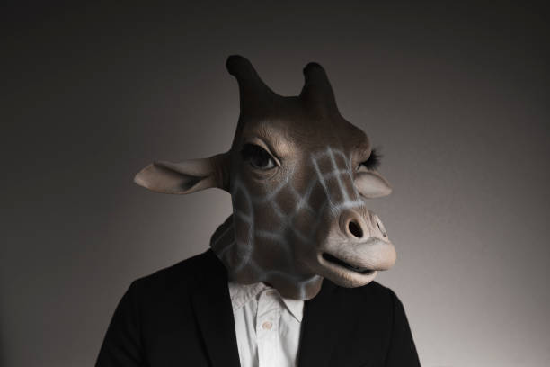 istock Portrait of man with giraffe mask 1130232986