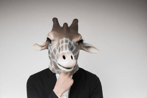 istock Portrait of man with giraffe mask 1130232992