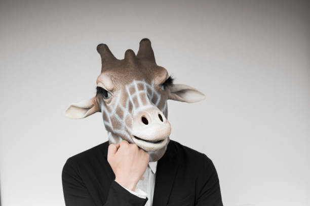 istock Portrait of man with giraffe mask 1130232994