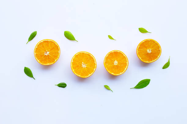 istock High vitamin C. Fresh orange citrus fruit with leaves isolated on white. 1130233812