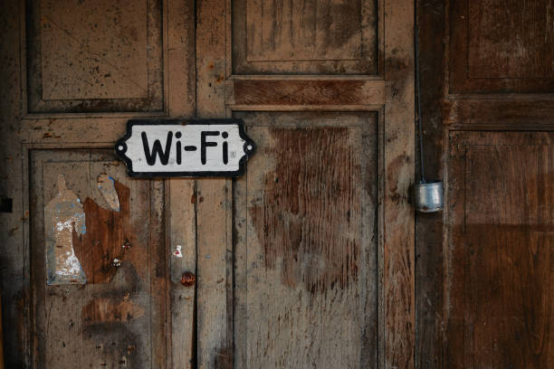 istock Wifi hot spot network label on wooden wall 1130237163