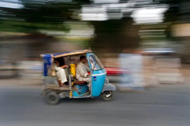 A panning of tuk tuk taxi in Pakistan.
