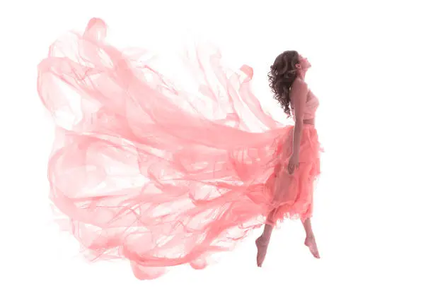 Photo of Woman in Fashion Pink Dress, Ballet Dancer Girl in Jump Flying in Dance