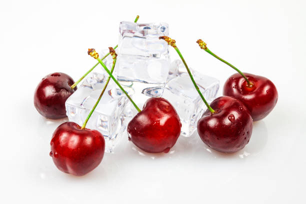istock Sweet cherries with ice cubes, yes against a white background 1130244216