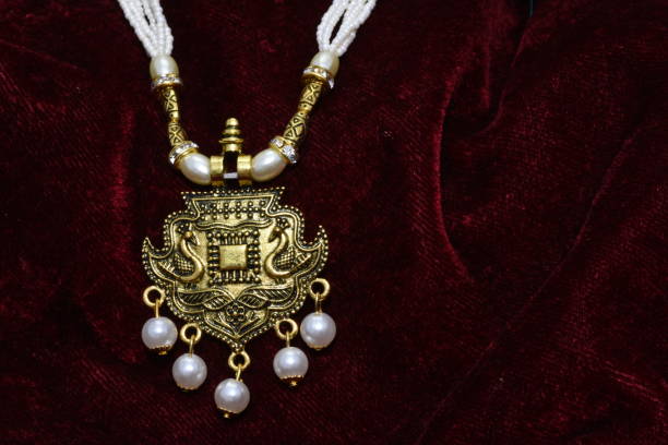 istock golden neck set with pendent closeup macro image 1130244645