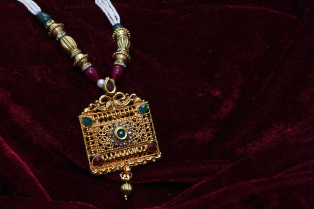 istock golden neck set with pendent closeup macro image 1130245364