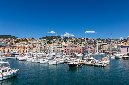 Various yachts, boats and ships in the port of Genoa, Italy