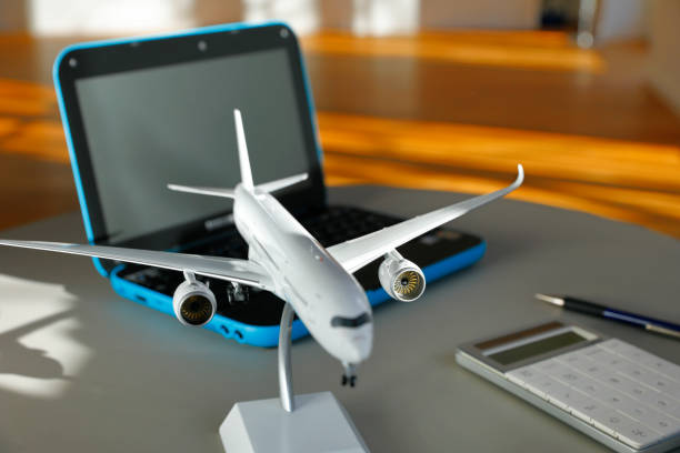 Planning a flight with aircraft scale model at home.
