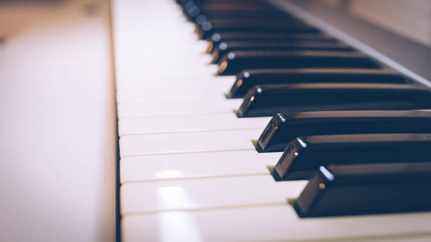 istock Keyboard of Old Piano in The Dark 1130247194