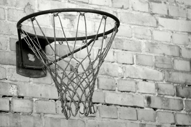 istock Old basketball hoop in black white 1130247247