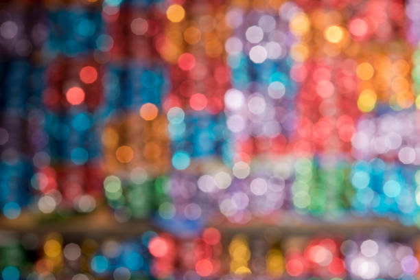 Defocused Christmas Background with Christmas Lights and Christmas Ornaments