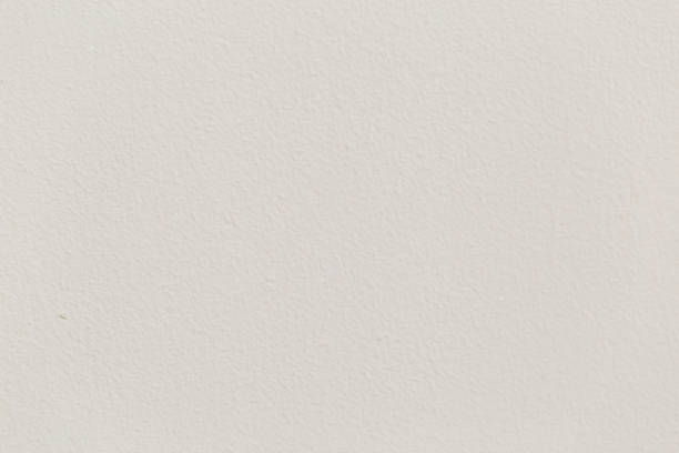 istock Blank concrete wall, cream color, dirty background 1130253598