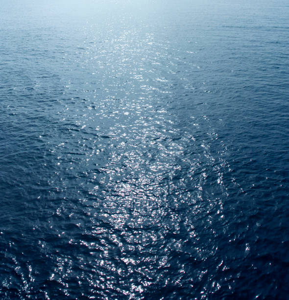 istock Sea water with sun highlights. 1130255317