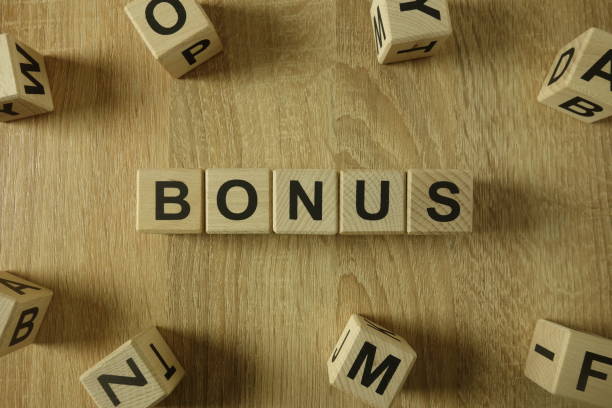 istock Bonus word from wooden blocks 1130256076