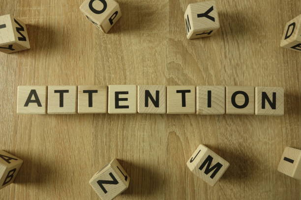 istock Attention word from wooden blocks 1130256301