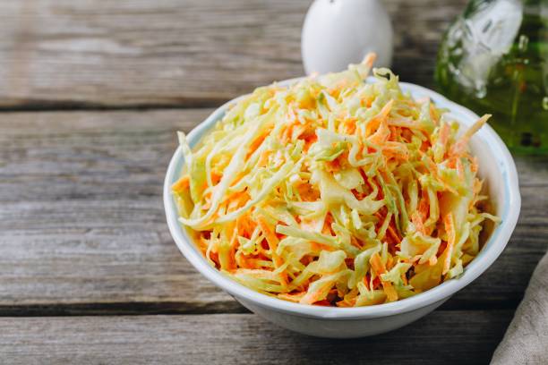 istock Coleslaw salad with white cabbage, carrots and mayonnaise dressing 1130256440
