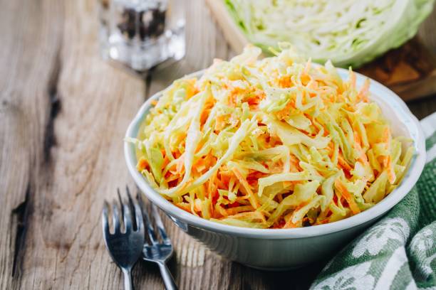 istock Coleslaw salad with white cabbage, carrots and mayonnaise dressing 1130256490