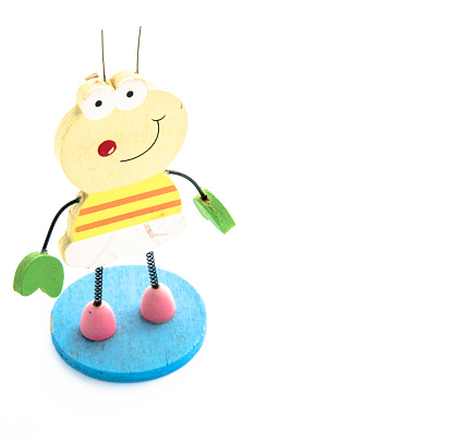 Wooden bee toy isolated on white background