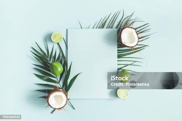 Summer Composition Tropical Palm Leaves Fruits Paper Blank On Pastel Blue Background Summer Concept Flat Lay Top View Copy Space Stock Photo - Download Image Now