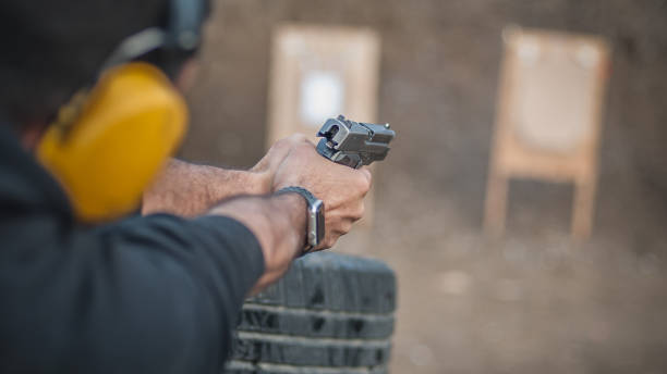 istock Shooting on target in shooting range. Back close-up detail view 1130261561