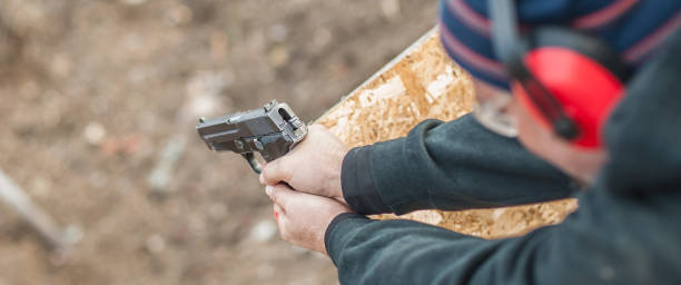 istock Shooting on target in shooting range. Back close-up detail view 1130261581
