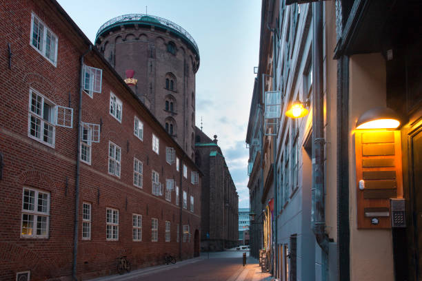 Empty street and Round Tower, Rundetaarn, in the morning, Copenhagen, capital of Denmark