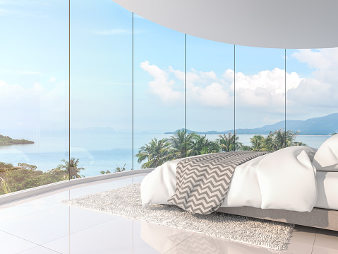 Panorama view bedroom 3d render,There are curve room with white floor,Furnished with white bed,There are large framless bay window overlooking to sea view.